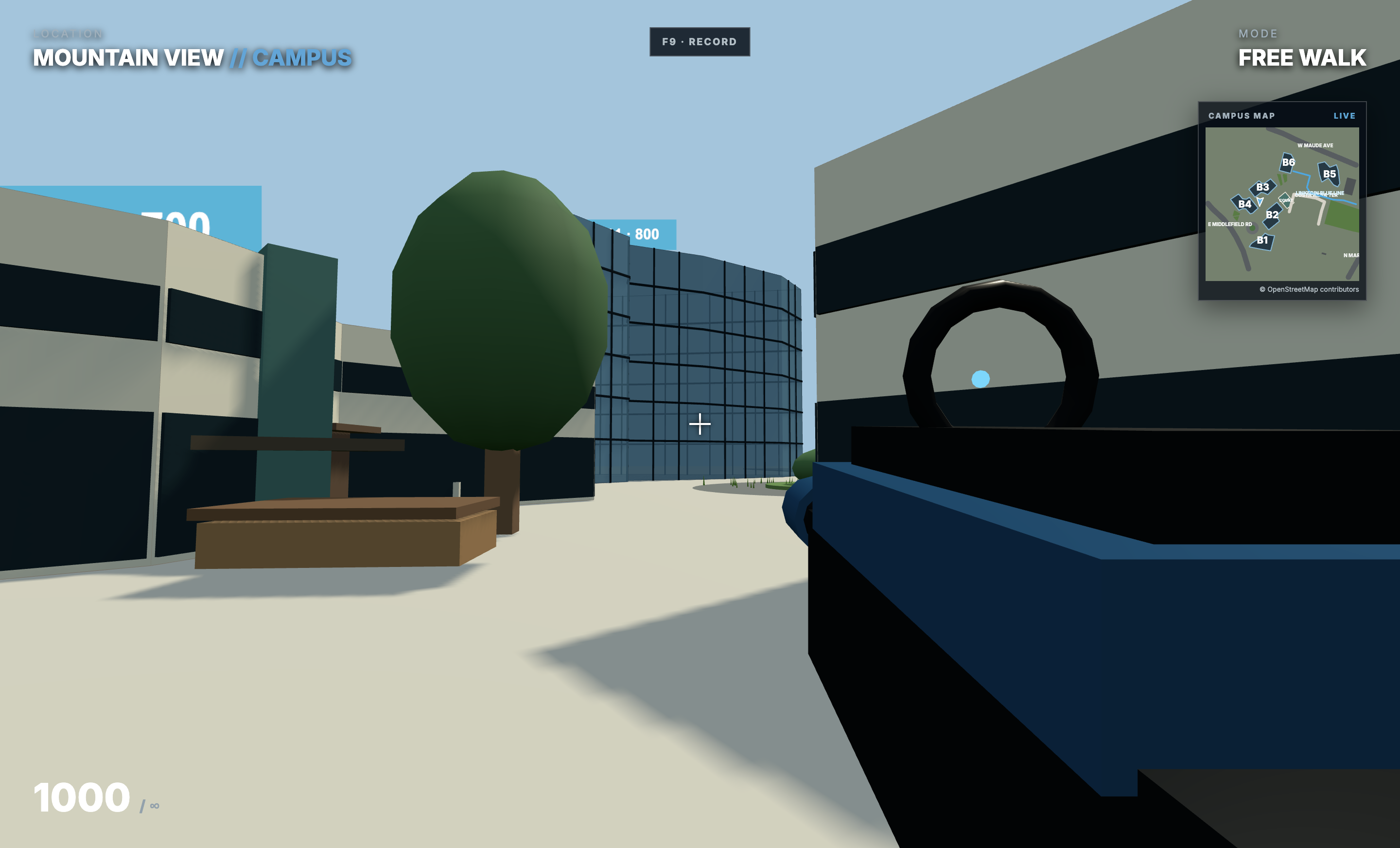First-person view between campus buildings and trees